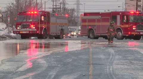 Broken water main flooding steam sinkhole in severe cold weather in Toronto 2015 Stock Footage 47028515