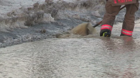 Broken water main flooding steam sinkhole in severe cold weather in Toronto 2015 Stock Footage 47029187