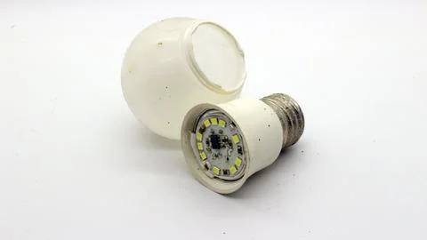Broken white bulb isolated Stock Photos