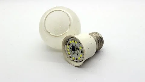 Broken white bulb isolated Stock Photos
