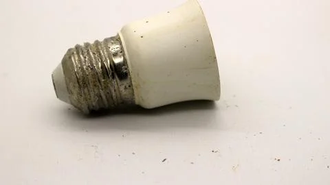 Broken white bulb isolated 写真素材