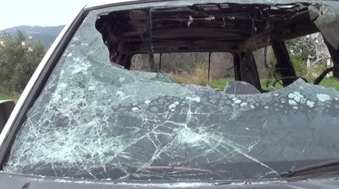 Broken wind screen of a blasted car Stock Footage 47403894