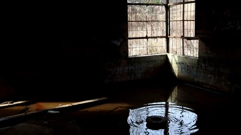 A Broken Window and it's Reflection on the Floor of an Abandoned Building, 4K Video stock 121977419