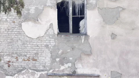 Broken window and yellow danger sign tilt Video stock 333656193