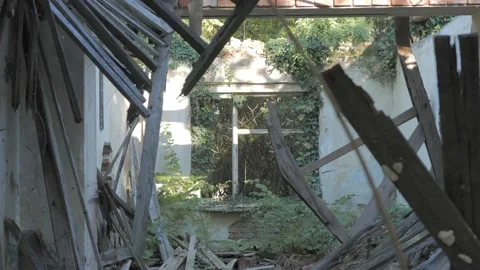 A broken window in a collapsed building Stock Footage 163767918