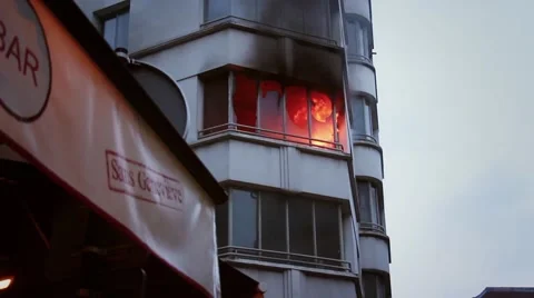 Broken window in flames and smoke after explosion - 1080p Video stock 55598755