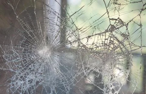 Broken window glass for background pattern. Broken glass texture. Stock Photos