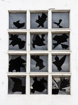 Broken window glasses. Stock Photos