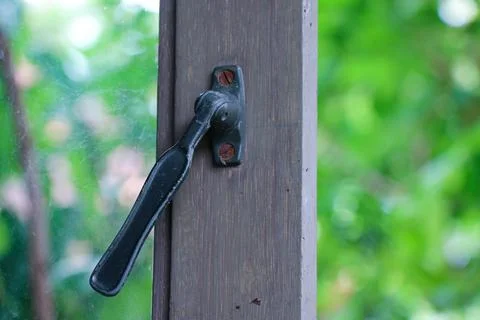 Broken window handle Stock Photos