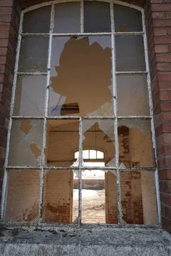 Broken Window In An Old Brick Building, Bulcote, Nottinghamshire, England Stock Photos