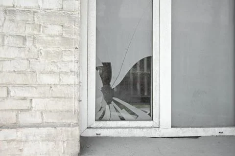 Broken window in an old building Stock Photos