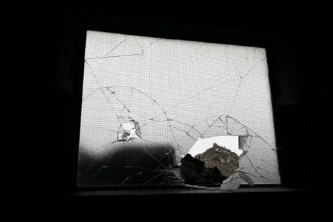 Broken window Stockfoto's