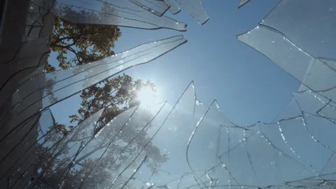 A broken window in the rays of the autumn sun Stock Footage 253223924