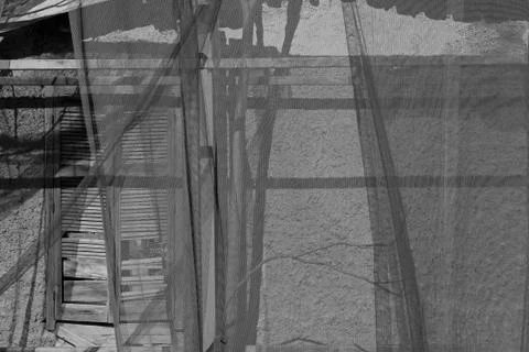 Broken window transparent netting Stock-Fotos