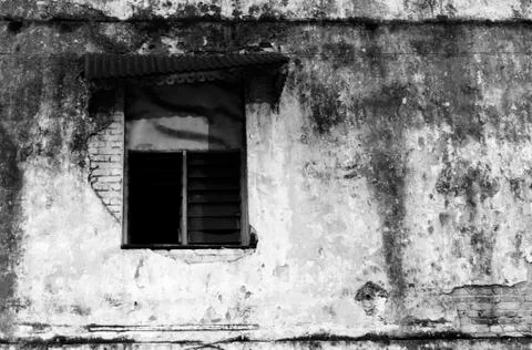 Broken window on weathered wall Stock Photos