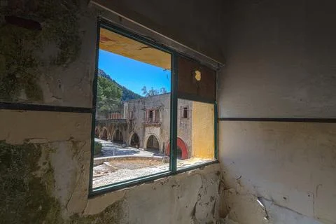 Broken windows of a building in Eleousa Stock Photos