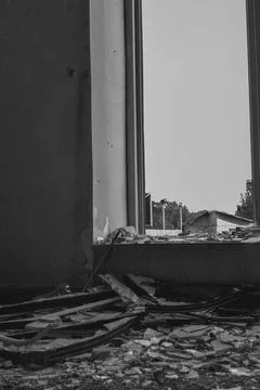 Broken windows in a destroyed school Stock Photos