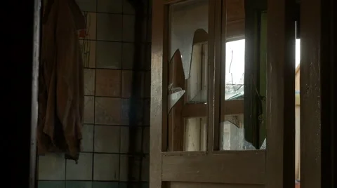 Broken windows in the interior doors. Abandoned house. Stock Footage 58128415