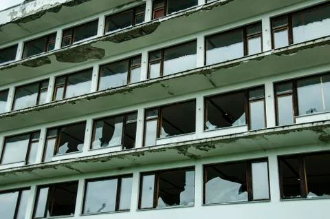 Broken Windows in the Old Building Stock Photos