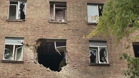 Broken windows in a residential building after Russian shelling of Kyiv Stock Footage 319884461