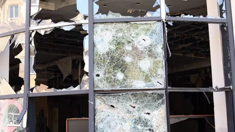 Broken windows from shelling. War. Destroyed property. Stock Footage 241110163