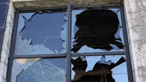 Broken windows from shelling. War. Destroyed property. Stock Footage 241110807