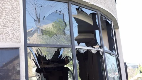Broken windows from shelling. War. Destroyed property. Stock Footage 241112304