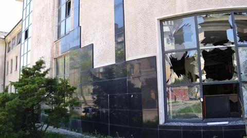 Broken windows from shelling. War. Destroyed property. Stock Footage 241112534