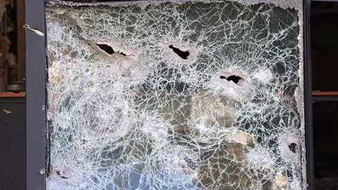Broken windows from shelling. War. Destroyed property. Stock Footage 241113364