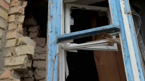 Broken windows with wooden frames due to a russian army shell Видео 196875783