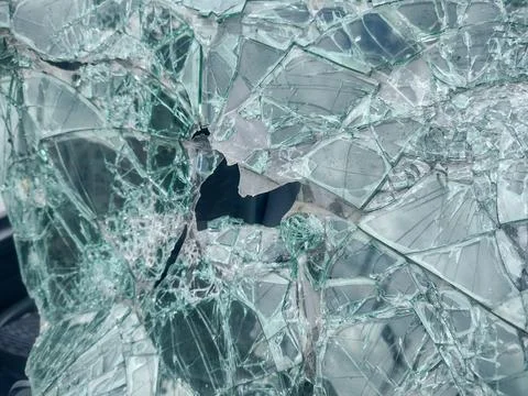 The broken windshield of an abandoned car Фото