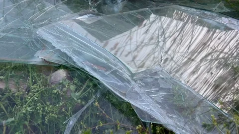 Broken windshield of a car in a garbage dump Video stock 240242593