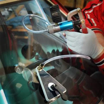 Broken windshield repairing Stock Photos