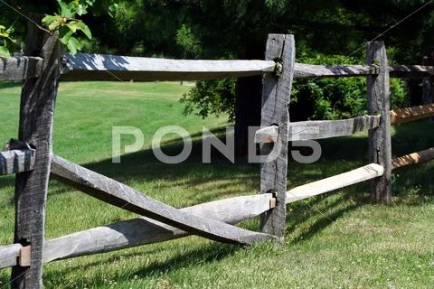 Broken wooden rail fence Stock Photos