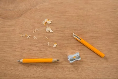 Broken yellow pencil with sharpener Stock-Fotos