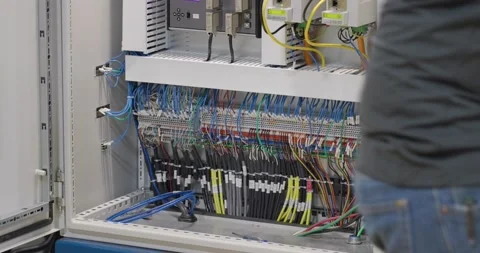 Broll of Person Working on Machine Wiring Stock Footage 200845843