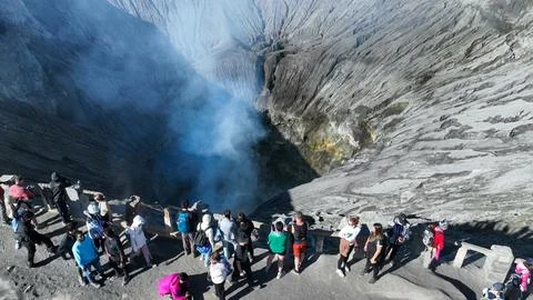 BROMO, JAVA, INDONESIA, JUNE 12, 2023: A group of explorers gathers at the Stock Photos
