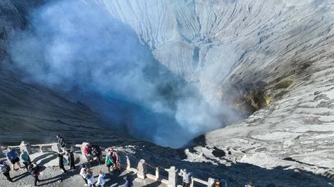 BROMO, JAVA, INDONESIA, JUNE 12, 2023: From above, the volcanic crater reveals Fotos Stock