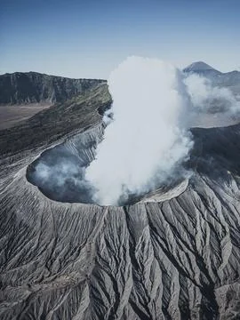 Bromo volcano erupting during summer sunny day in Bromo Tengger Semeru Nati.. Stock Photos