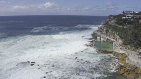 Bronte Baths | Scenic Waves | Circling Drone Shot | 4k HDR 스톡 동영상 207718902