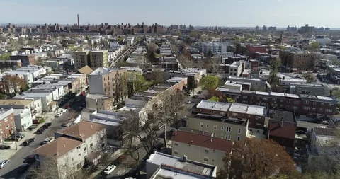 Bronx Row Houses and Apartment Blocks across Street Grid Stock Footage 89245853