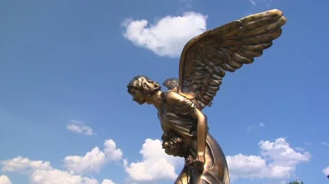 Bronze angel on a background of clouds Stock Footage 12278786