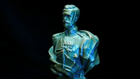 Bronze bust of the Emperor Nicholas ii - tsar of Russia rotates on a black back Stock Footage 120731175