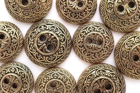     Bronze buttons with baroque pattern, two sizes mix  Stock Photos
