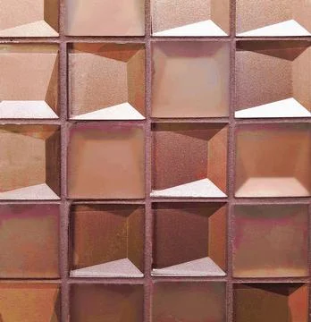 Bronze ceramic tile with geometric pattern for wall and floor decoration. Con Stock Photos