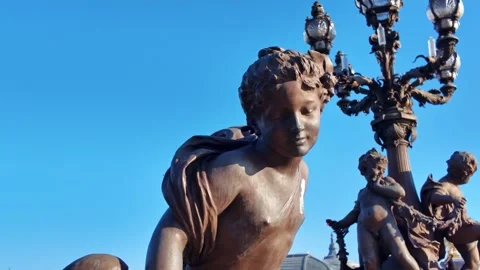 Bronze cherub statue on vintage lamppost of Pont Alexandre III in Paris, France Stock Footage 336900328