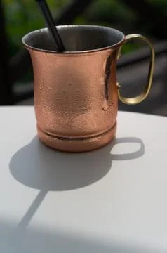 Bronze coffee mug Stock Photos