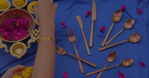Bronze color cutlery set on the table Stock Footage 260543020