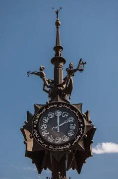 Bronze composition with the clock set at the beginning of Bauman street in Kazan Stock Photos