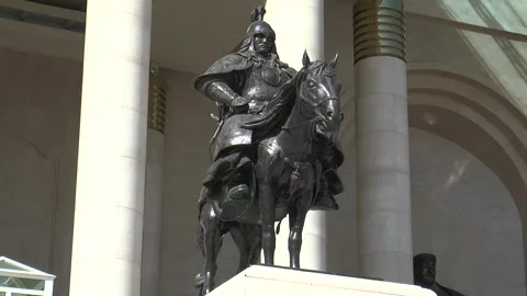 A bronze figure of an equestrian general next to the statue of Genghis Khan. Stock Footage 302759264